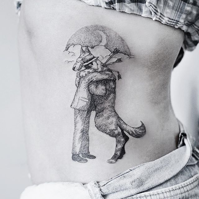 Black tattoo of a man hugging a wolf on the ribs