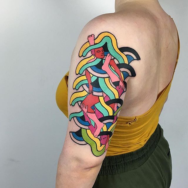 Abstract tattoo of a human body and colored lines on the left hand