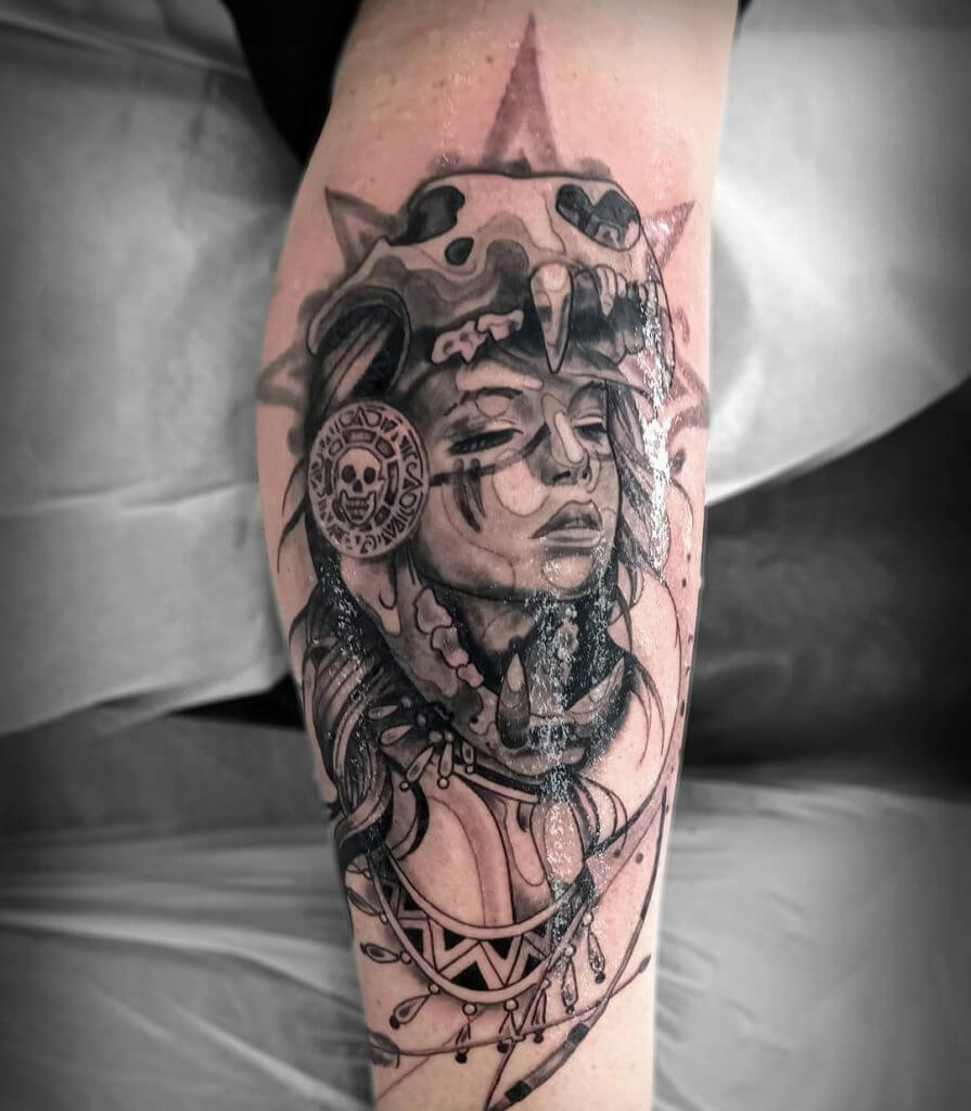 Black and Gray Tattoo of a female Warrior on the right calf