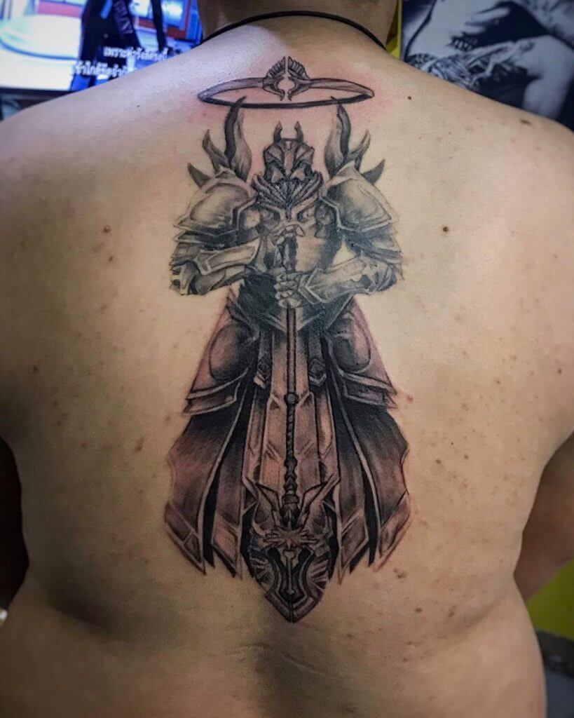 Black and Gray Tattoo of a male Warrior on the back