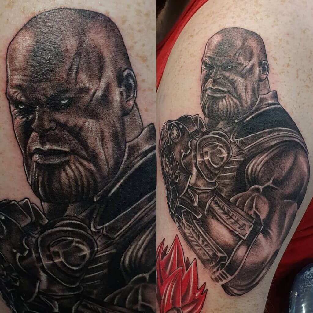 Black Male tattoo of Thanos on the right shoulder