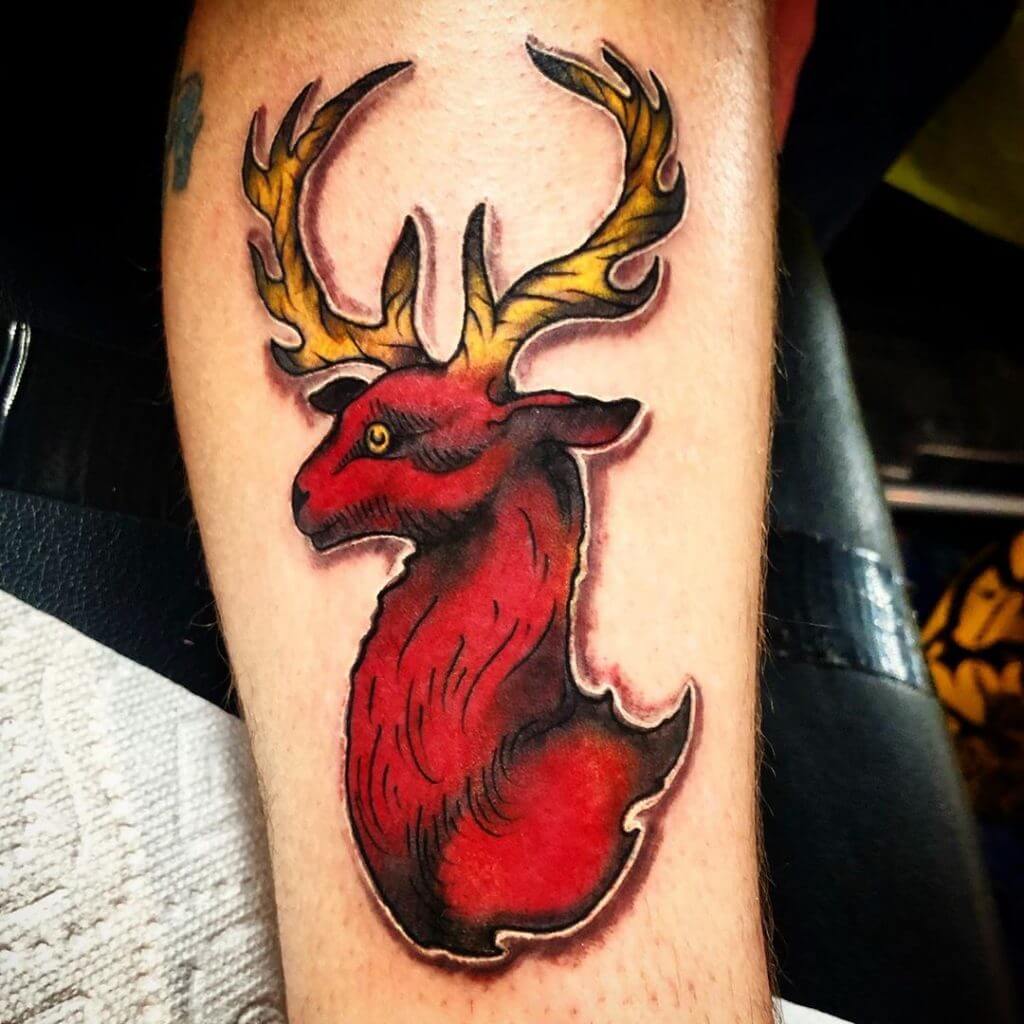 Deer Sticker tattoo on the right forearm