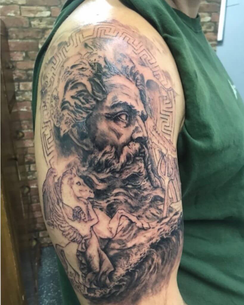 Black Male tattoo of Poseidon on the right shoulder
