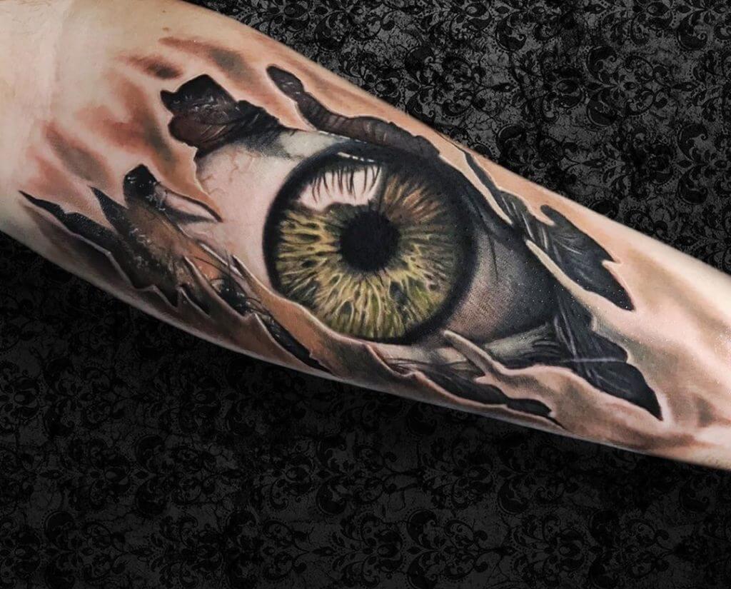 3D Color tattoo of an eye on the left forearm