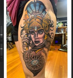 Color Tattoo of a female Warrior on the left thigh