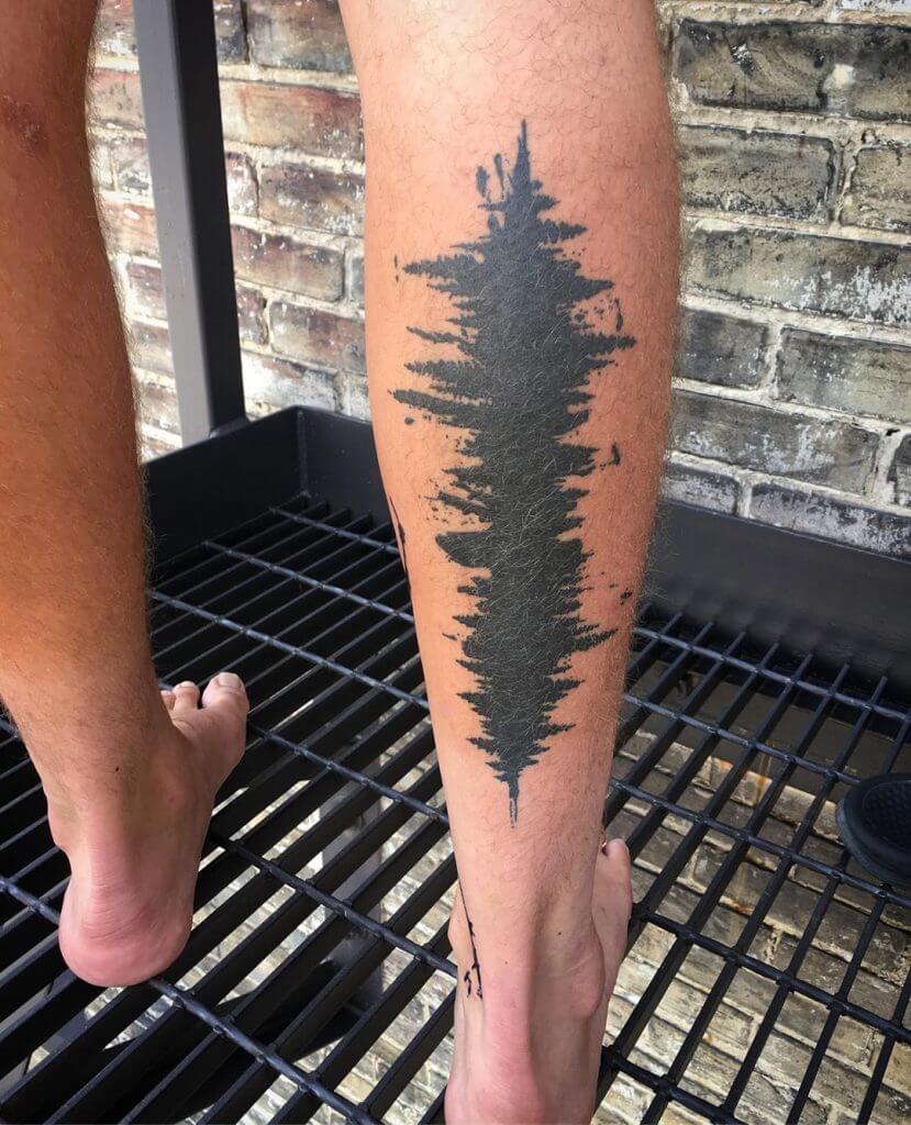 Abstract tattoo on the right calf