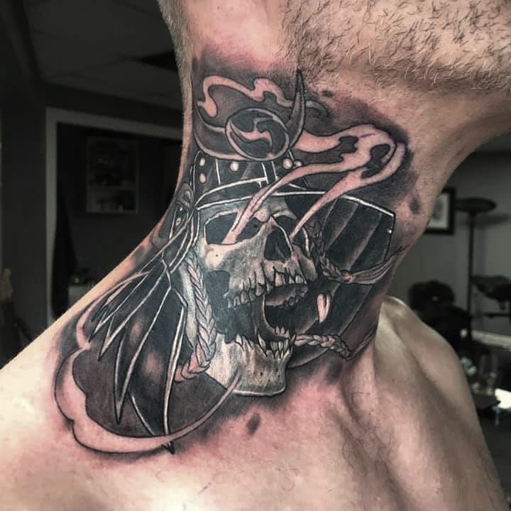 Black Mans tattoo warrior skull on the neck