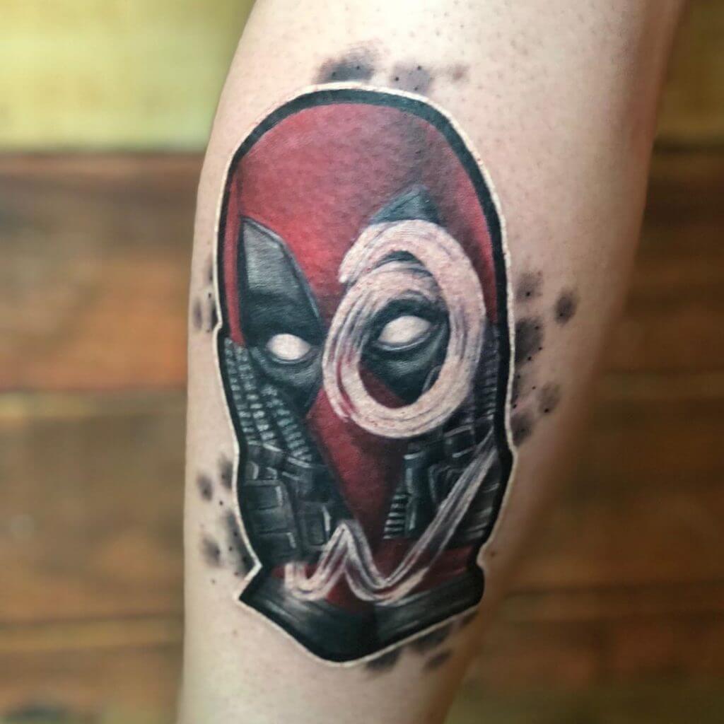 Deadpool Sticker tattoo on the left calf