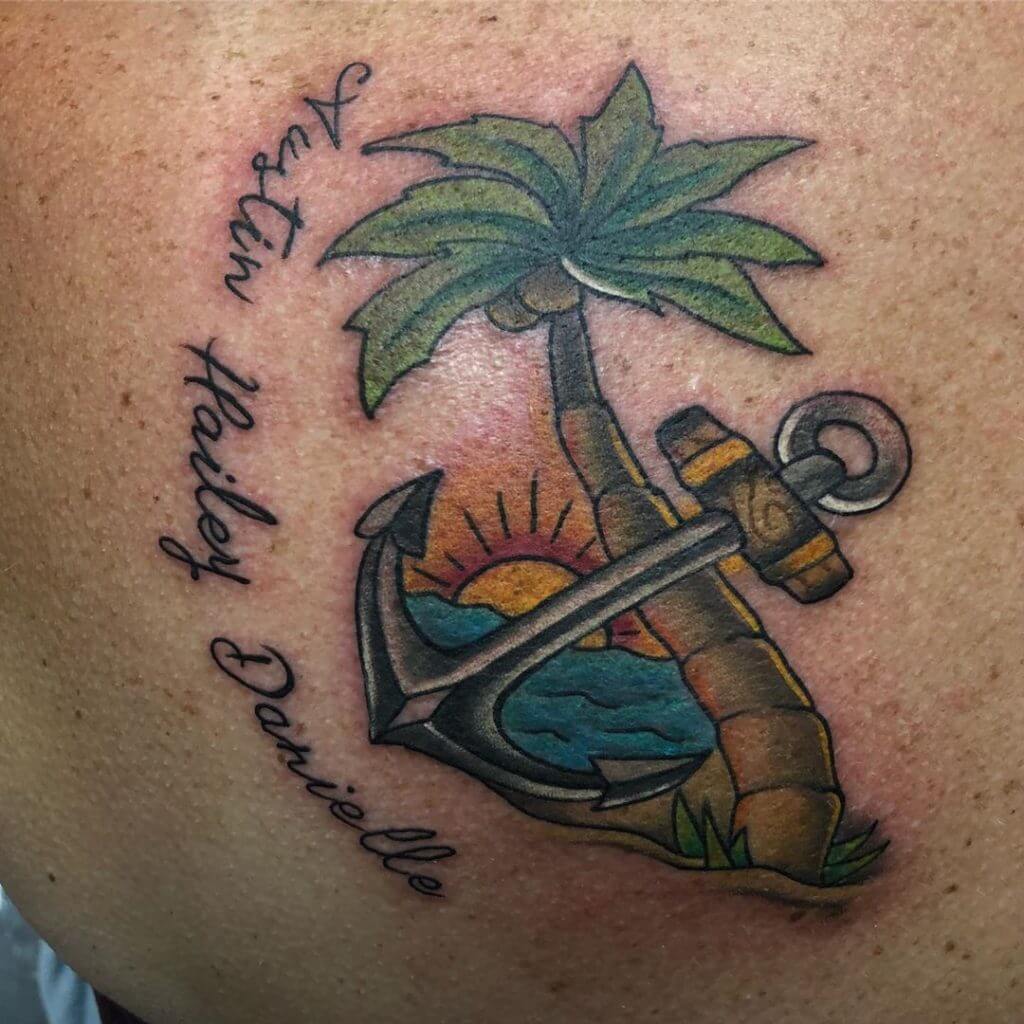 Color Anchor tattoo with a palm tree and a sunset