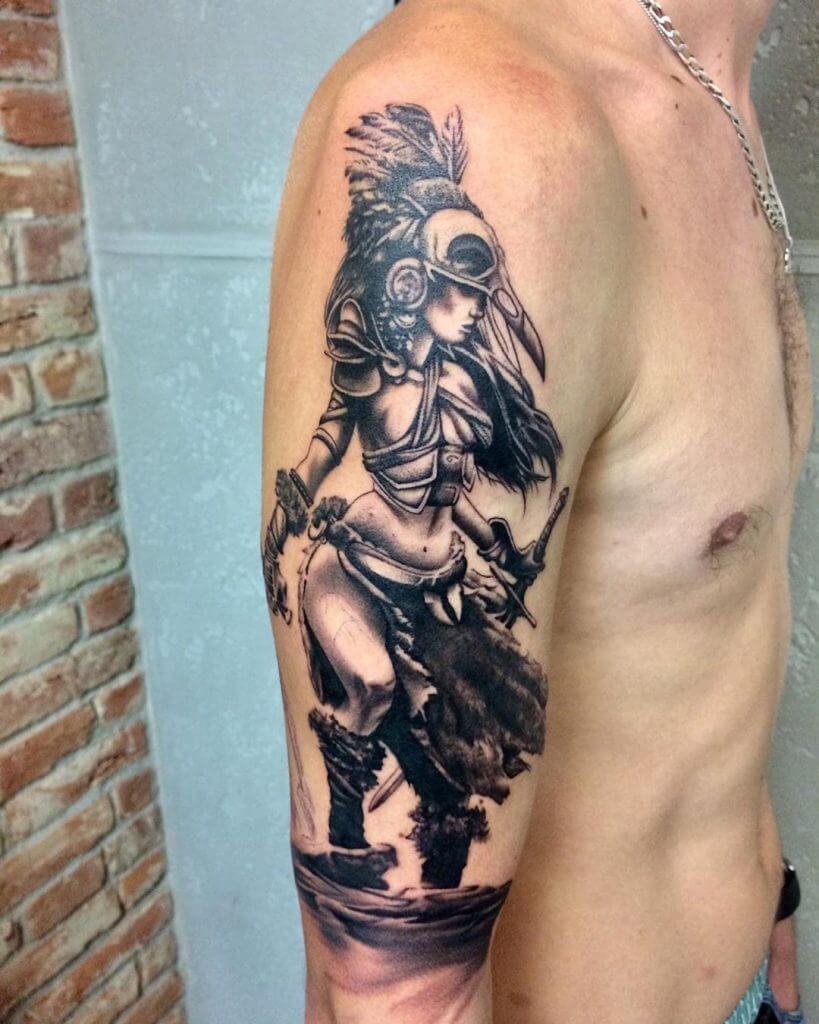 Black Tattoo of a female Warrior on the right shoulder