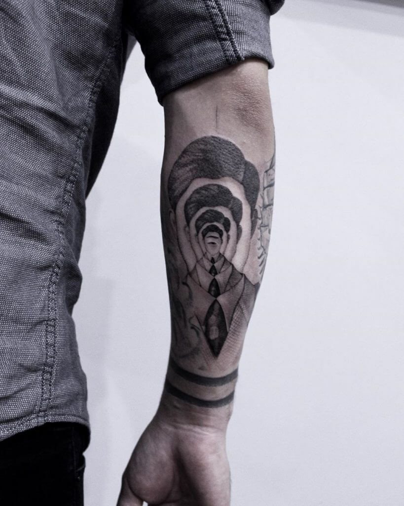 Abstract tattoo on the right forearm