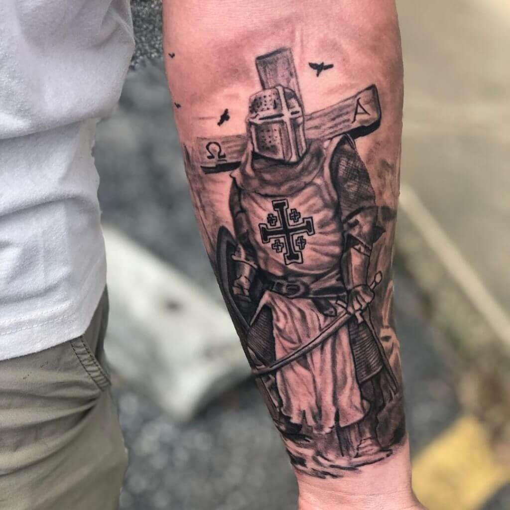 Male tattoo, of a knight on the left forearm