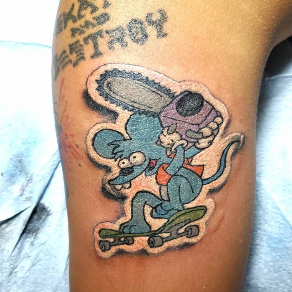 Sticker tattoo of Itchy from the Simpsons on the leg