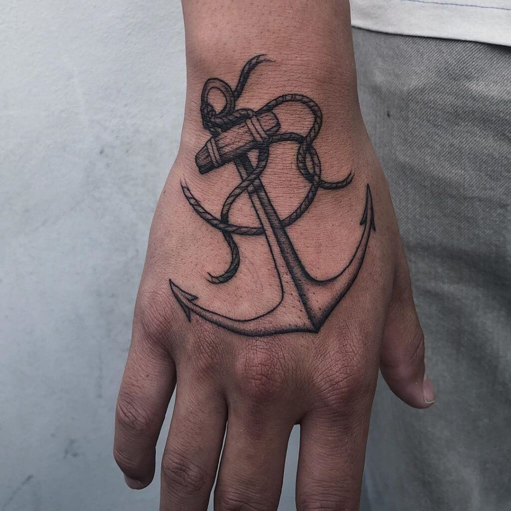 Black Anchor tattoo on the right hand