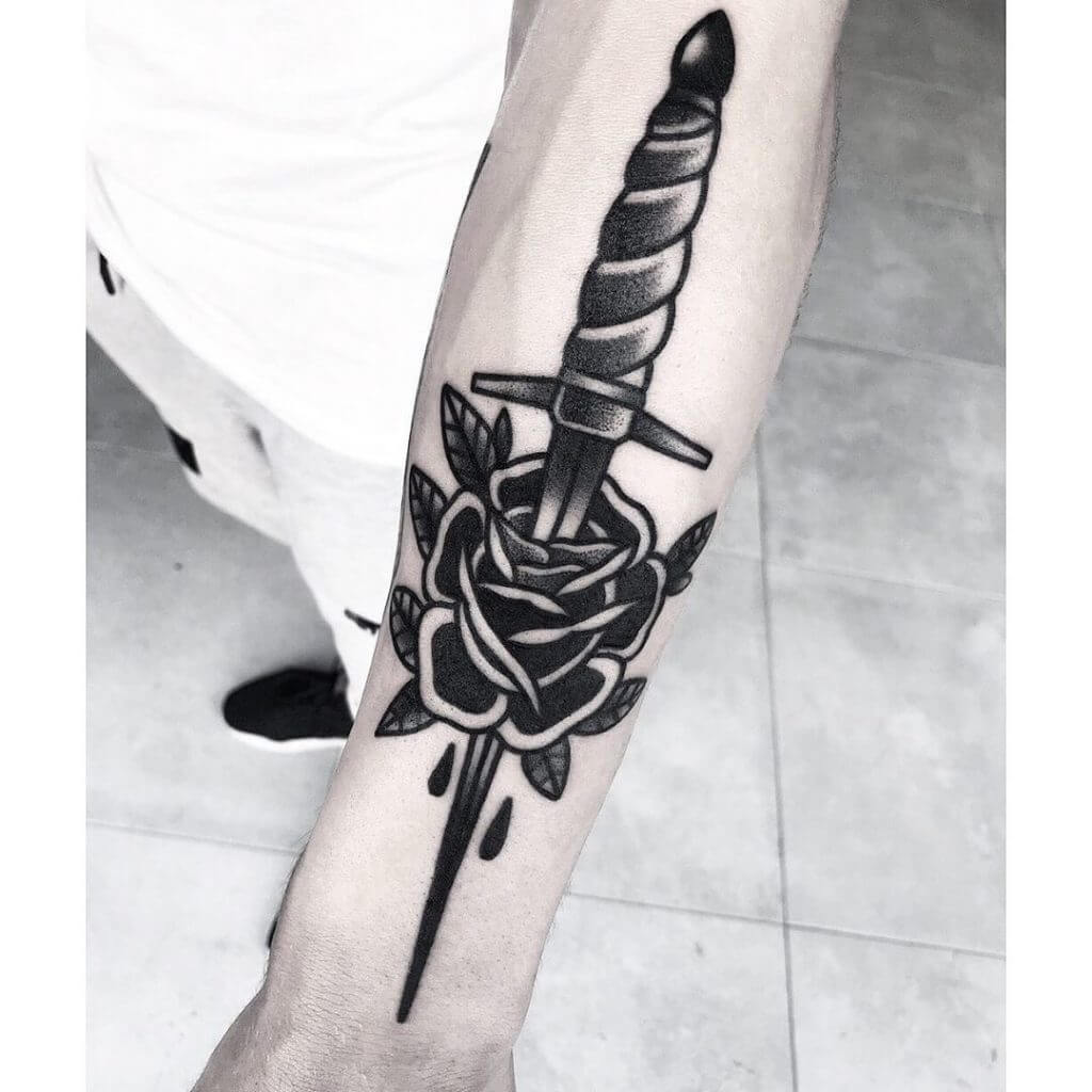 Snake and Dagger Tattoo Meaning A Symbol of Determination