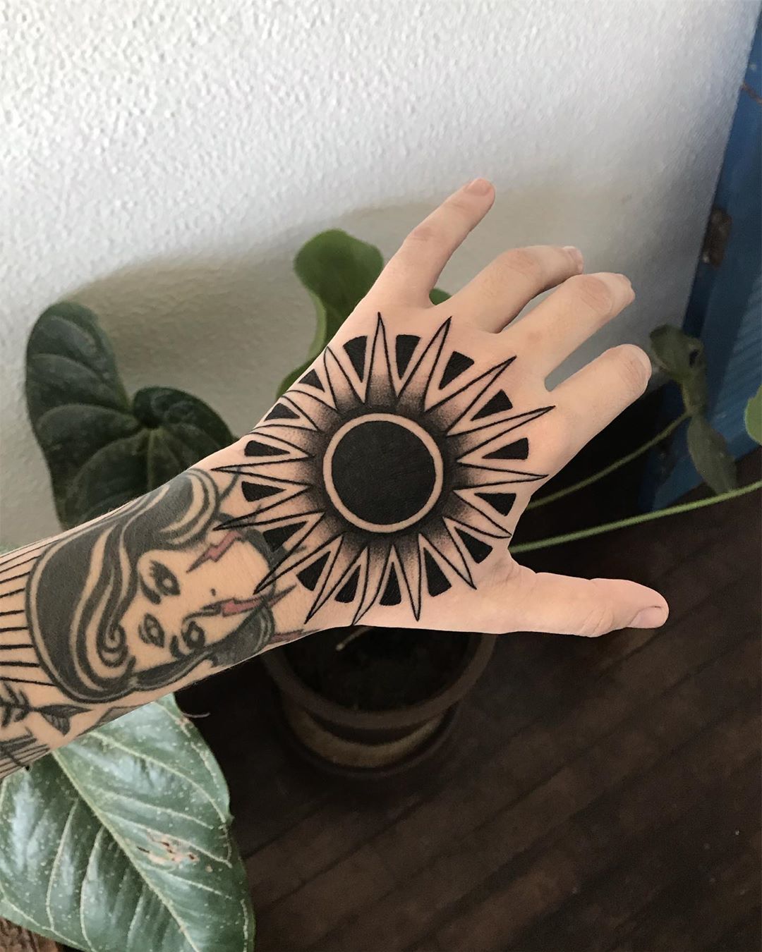 Beware of secret symbolism of sun tattoo