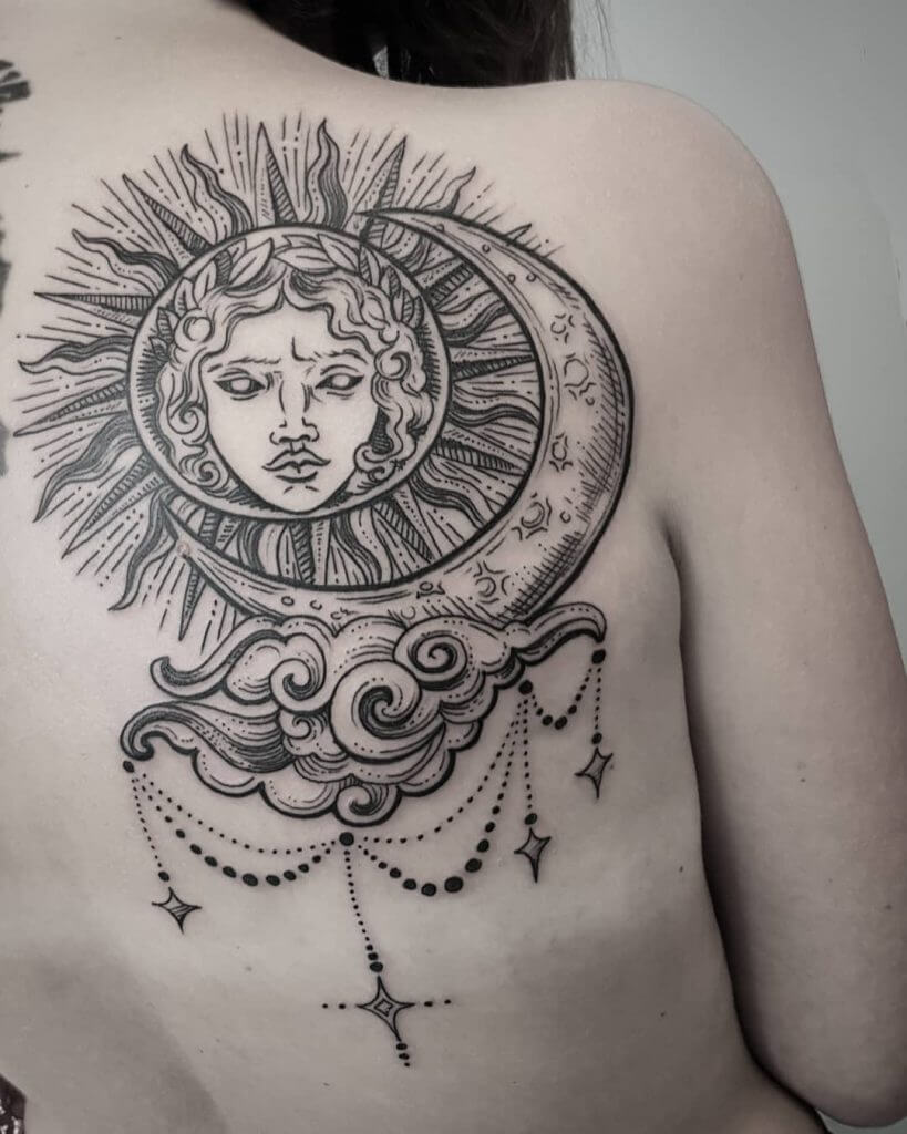 Black Sun tattoo with a moon on the chest