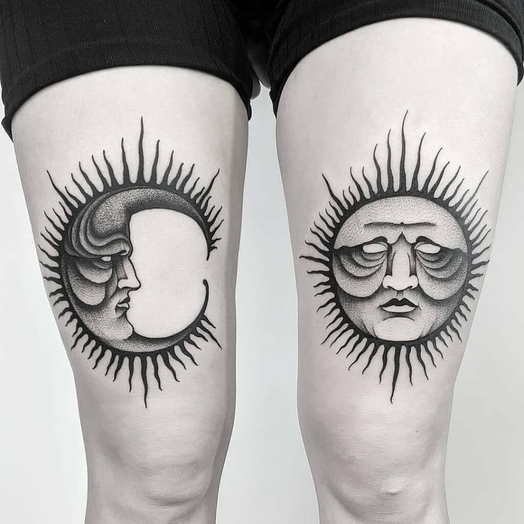 Black Sun tattoo with a moon on thighs