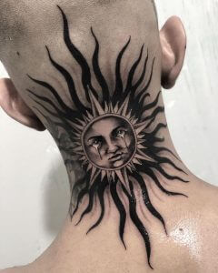 Black Sun tattoo on the hair line
