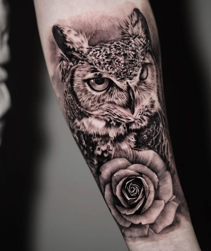 A realistic tattoo of an owl