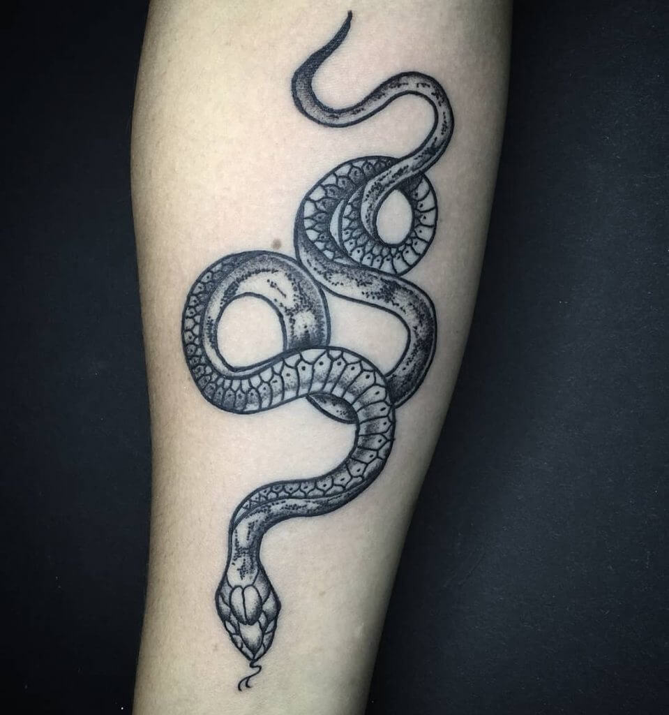 A black tattoo of a snake