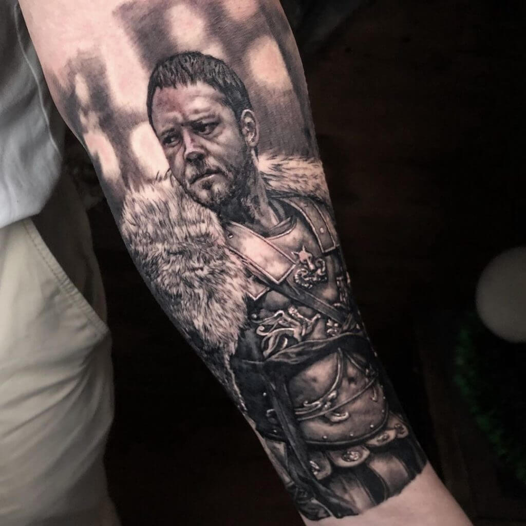 Gladiator tattoo of Maximus on the arm