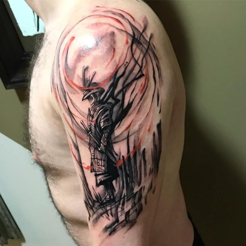 Samurai tattoo on the left arm