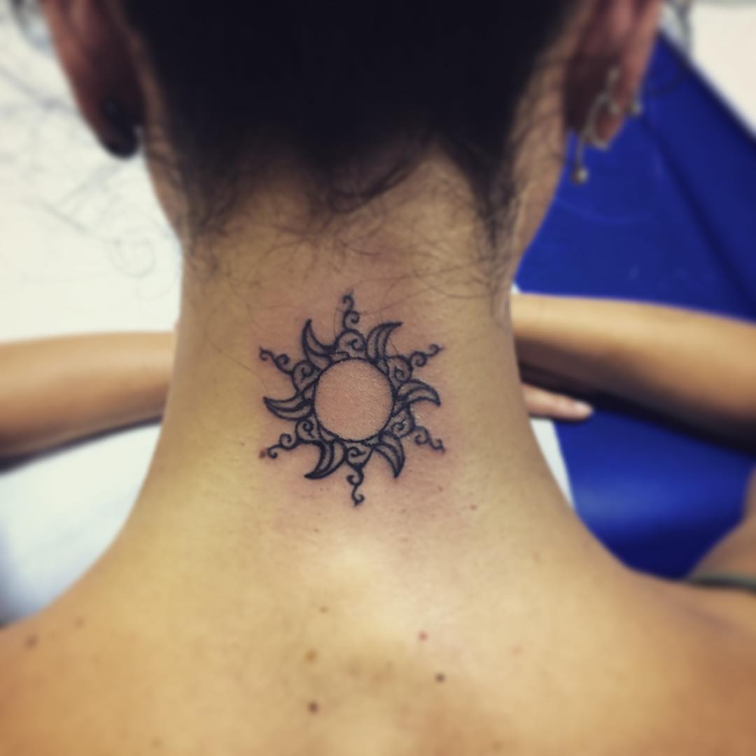 Tiny sun tattoo on the neck  Tattoogridnet