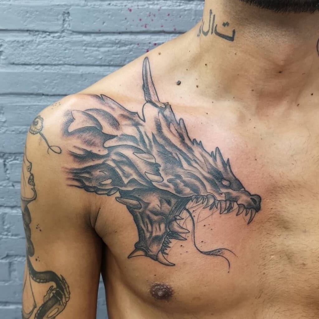 Black dragon tattoo for man on the right side of the chest