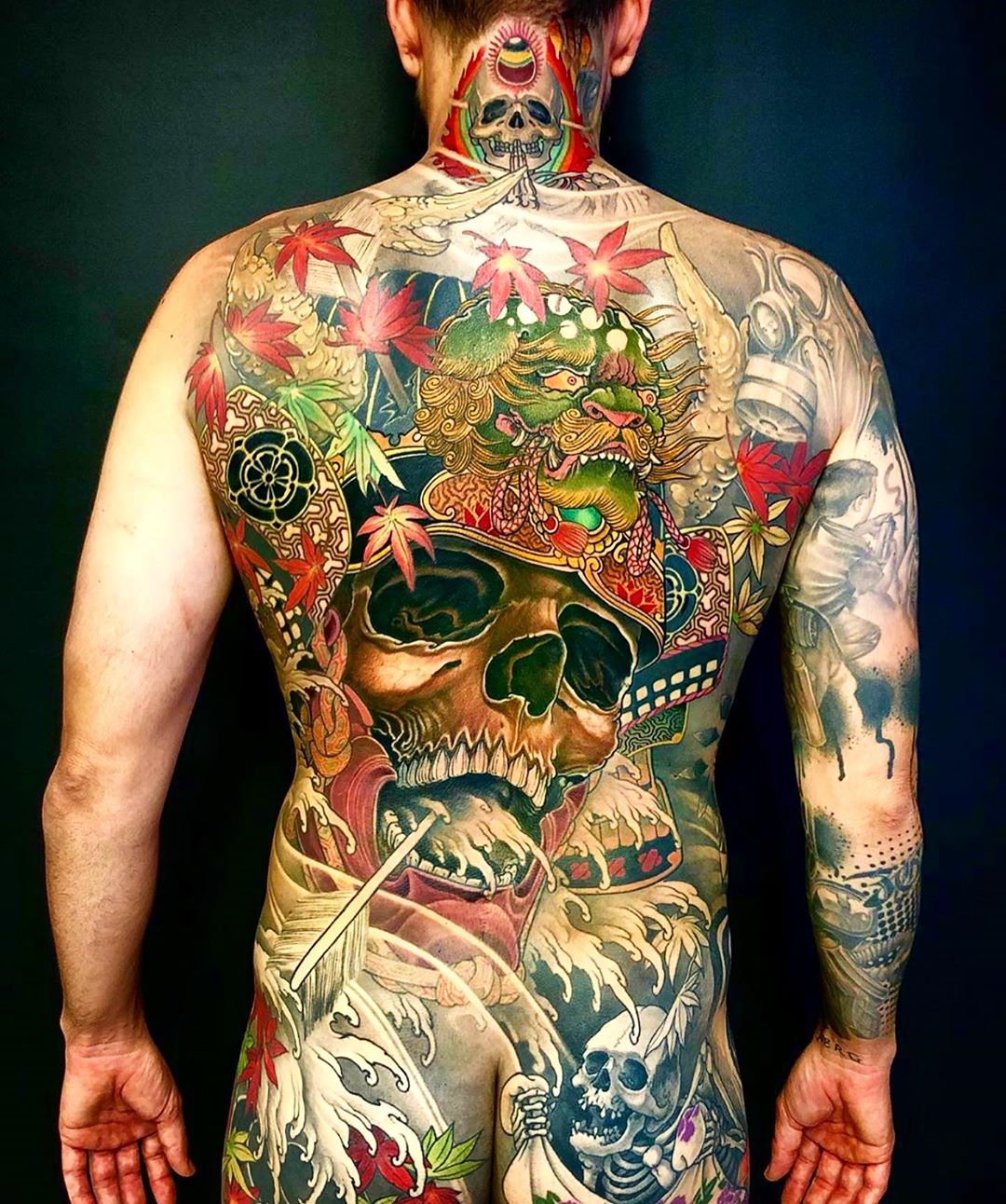 Inspiring Black And Red Samurai Tattoo On Man Upper Back