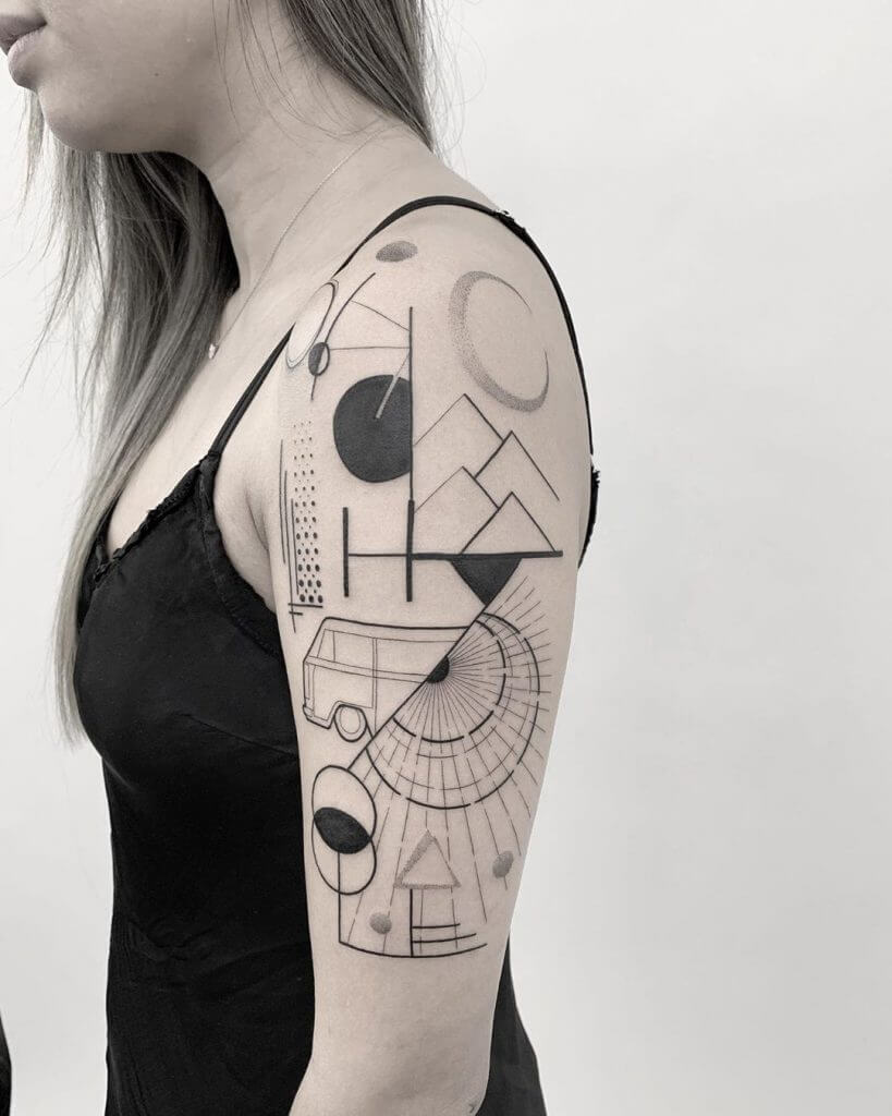 Abstract geometric tattoo on the left arm