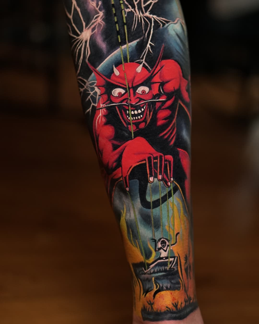 Eddie Iron Maiden patch tattoo located on the calf