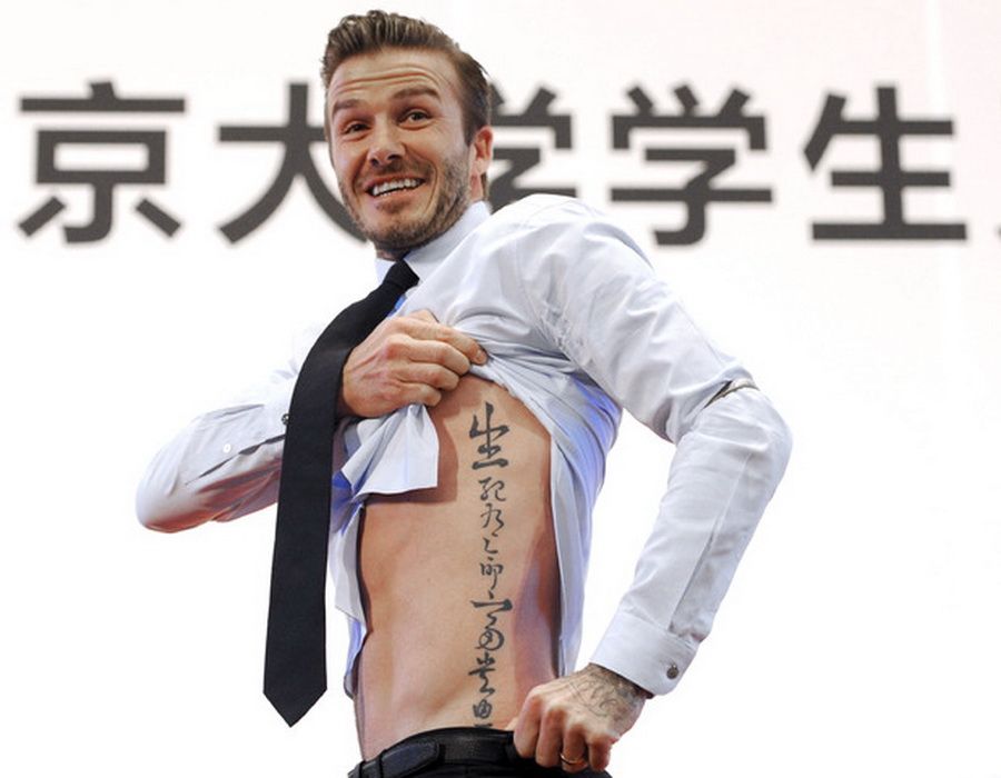 David Beckham inked some Chinese motifs