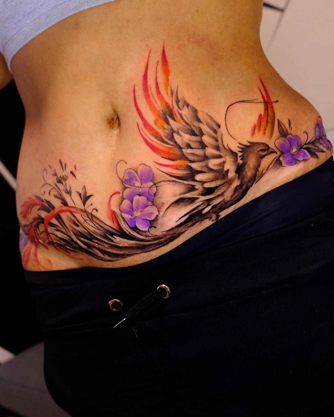 Here are some ideas for female belly tattoos