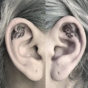 We offer you some interesting EAR tattoos 4