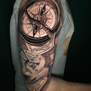 Whether you are a woman or a man a tattoo with a compass always looks nice on your body 1