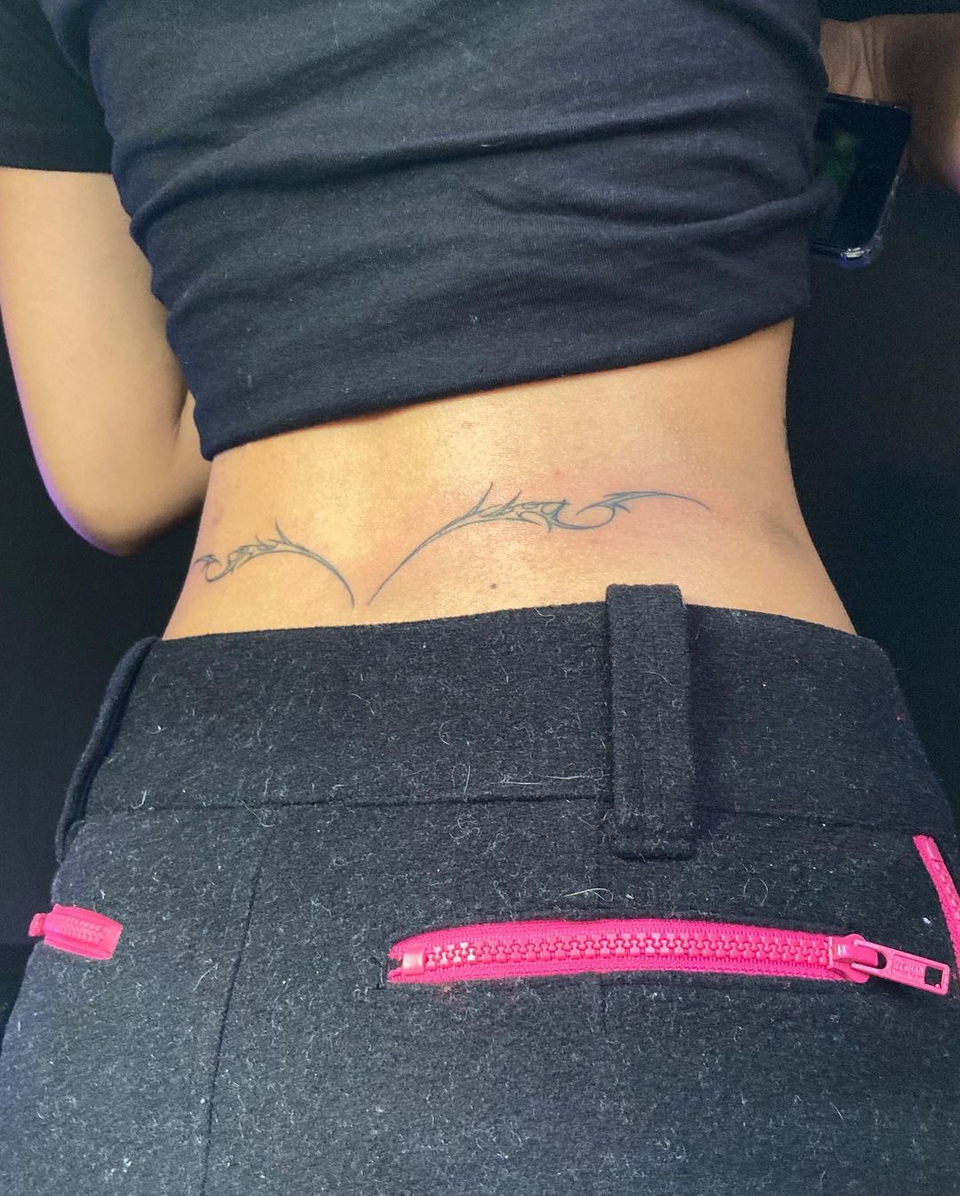 Interesting Lower back tattoos for women