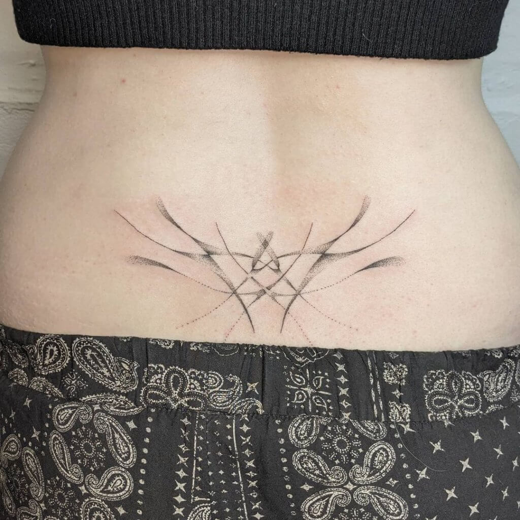 Interesting Lower back tattoos for women