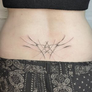 Interesting Lower back tattoos for women 3