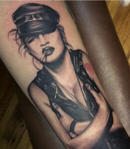 If you are a fan of Madonna singer you can choose one of these tattoos 1