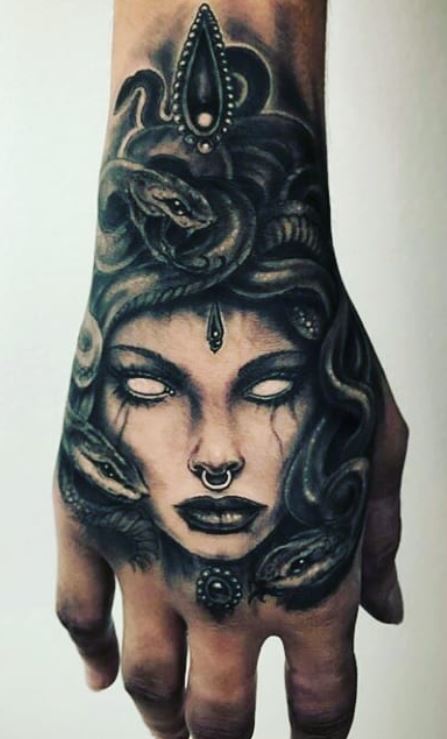 Medusa tattoo on hand for men and women