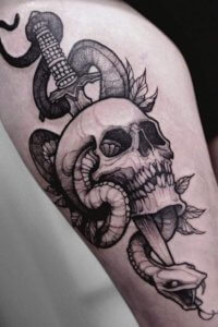 10 unforgettable snake coming our of skull tattoos 10