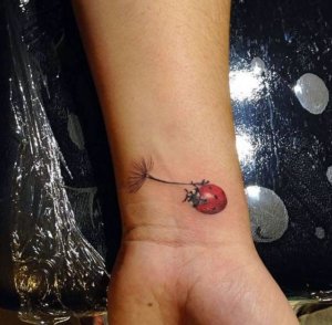 As ladybug is so small it is the great idea for wrist tattoo 2