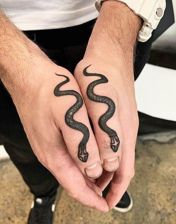 Keep it simple and get a simple snake tattoo