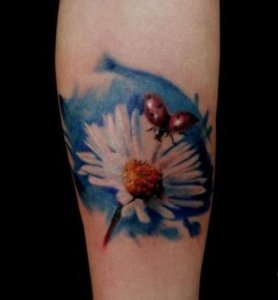 Magic cuteness of ladybug tattoo with flowers 4