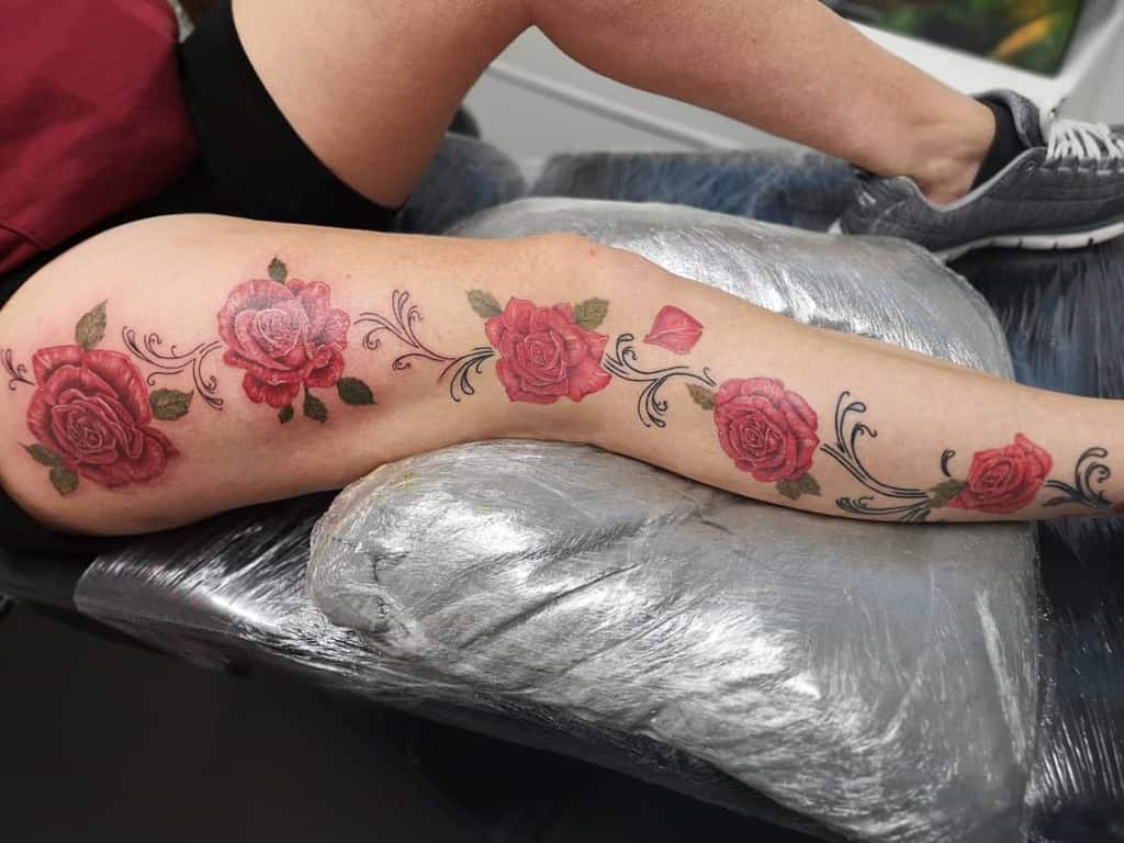 Roses come in many colors so they may be a good fit for full leg tattoo