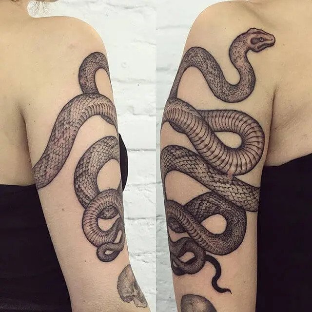 Supercharge your arm with some of these arm snake tattoos