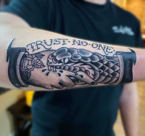 10 Popular Trust no One gangster style tattoos