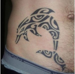 10 extraordinary ideas of dolphin tattoo for guys 4