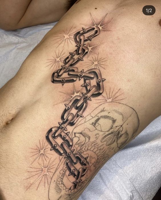 broken chain tattoo